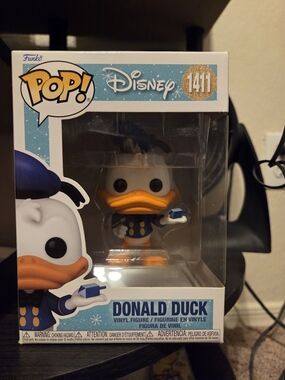 Funko Pop! Disney Donald Duck Holding A Deidel Vinyl Figure